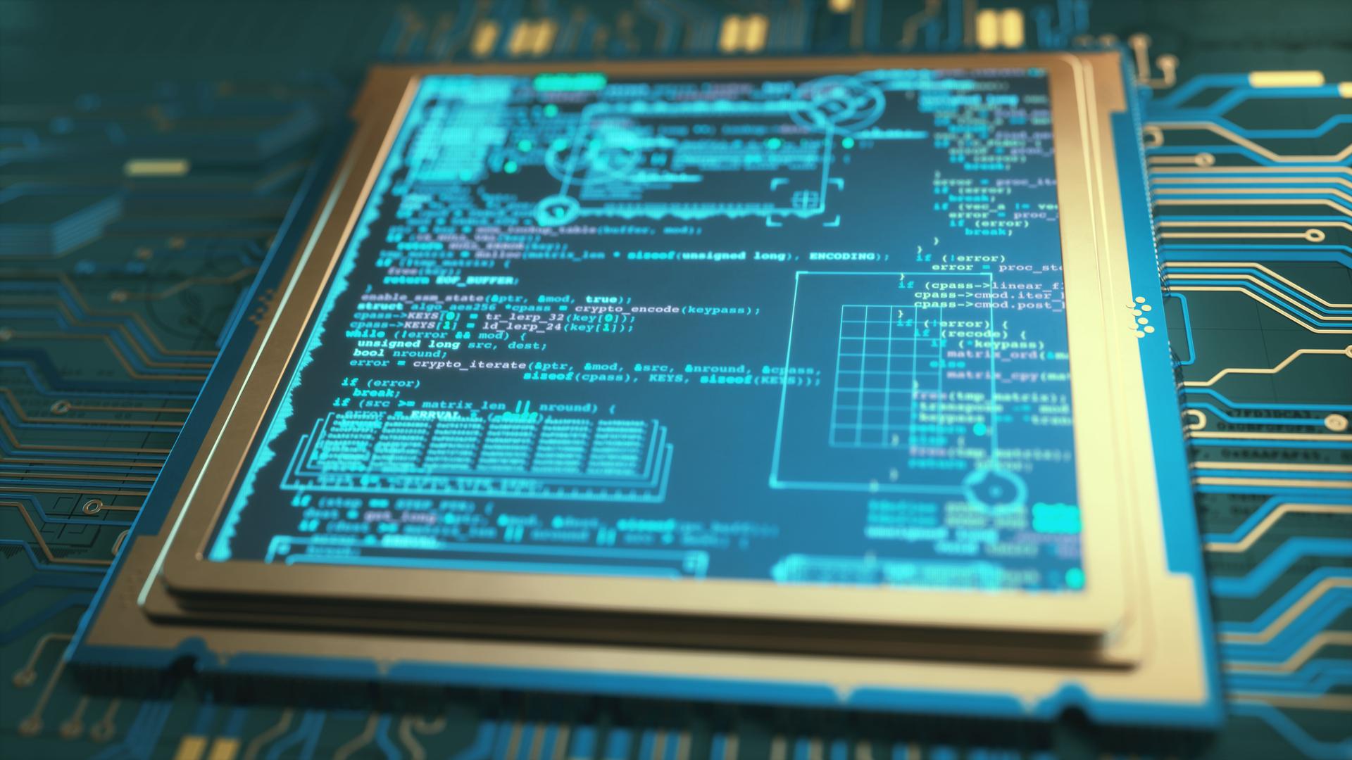 Close up on a micro-processor chip and circuit design with a digital display showing programming language code and infographics.